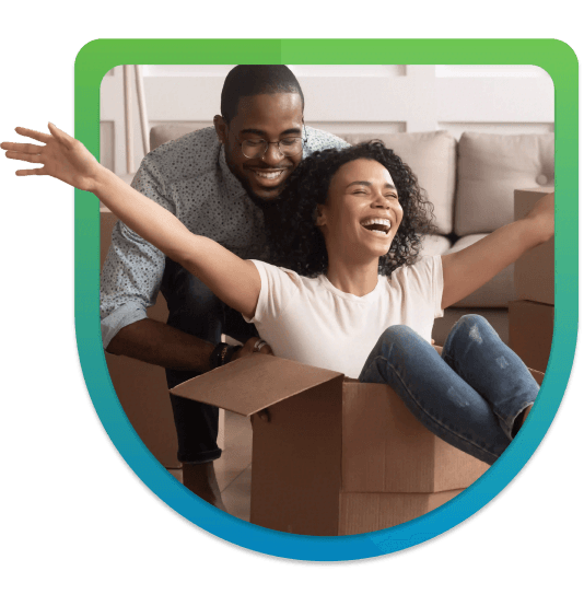 Man pushing woman in cardboard box