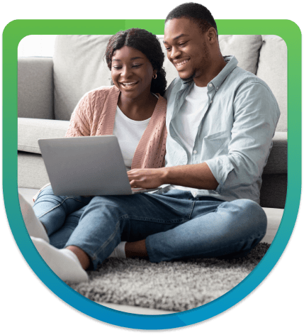 image of a couple using a laptop.